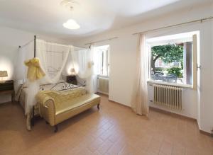 Postel nebo postele na pokoji v ubytování Residenza Di Via Piccardi