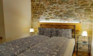 Postel nebo postele na pokoji v ubytování Hôtel St-Georges Romont