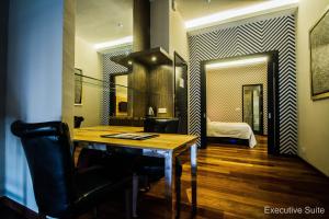 Voodi või voodid majutusasutuse The Ranee Boutique Suites toas