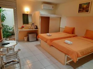 Postel nebo postele na pokoji v ubytování Fancy Carp Resort + 220 fotografií