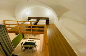 A bed or beds in a room at Il Vicolo Home 2