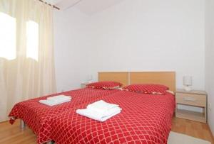 Posteľ alebo postele v izbe v ubytovaní Apartments M&P