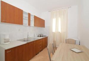 Kuchyňa alebo kuchynka v ubytovaní Apartments M&P
