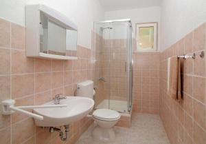 Kúpeľňa v ubytovaní Apartments M&P + 11 fotografií