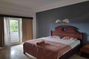 Postel nebo postele na pokoji v ubytování Pecatu GuestHouse