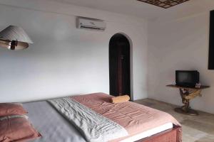 Postel nebo postele na pokoji v ubytování Pecatu GuestHouse