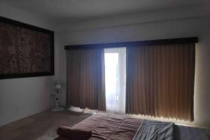 Postel nebo postele na pokoji v ubytování Pecatu GuestHouse