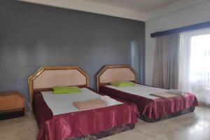 Postel nebo postele na pokoji v ubytování Pecatu GuestHouse