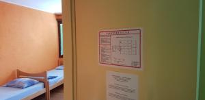 Llit o llits en una habitació de Hostel AV Palanka