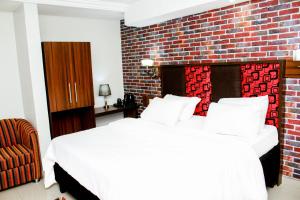 Postel nebo postele na pokoji v ubytování Shamrockmanor(TheResidence)