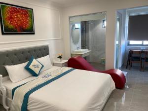 Postel nebo postele na pokoji v ubytování Sun Hill Hotel
