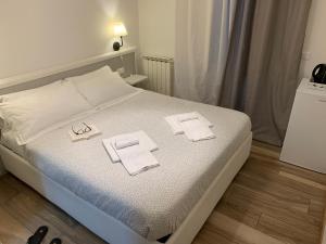 Postel nebo postele na pokoji v ubytování Affittacamere LevantoMare + 17 fotografií