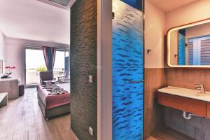 Postel nebo postele na pokoji v ubytování Carine Hotel Park