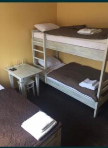 Ένα ή περισσότερα κρεβάτια σε δωμάτιο στο Euro Hotel Hostel