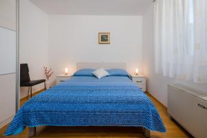 Postel nebo postele na pokoji v ubytování Villa Kogo