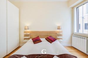 Posteľ alebo postele v izbe v ubytovaní Residenza Gonfalone