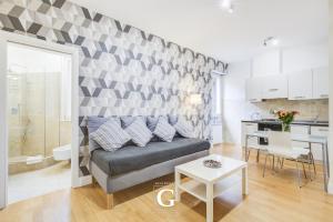 Kuchyňa alebo kuchynka v ubytovaní Residenza Gonfalone + 37 fotografií