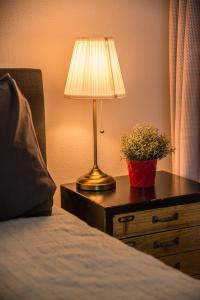 Кровать или кровати в номере Casa Allegria - Zuiderbosch