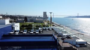 
a large body of water with boats parked on it at Altis Belem Hotel & Spa - Design Hotels in Lisbon
