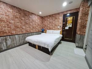 Bin Chen Business Hotelにあるベッド