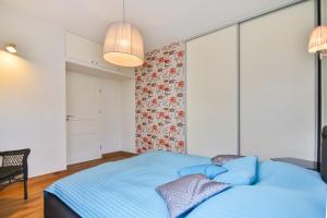 Posteľ alebo postele v izbe v ubytovaní Apartamenty Świnoujście - Rezydencja Sienkiewicza