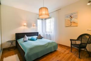 Posteľ alebo postele v izbe v ubytovaní Apartamenty Świnoujście - Rezydencja Sienkiewicza