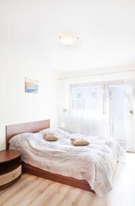 Posteľ alebo postele v izbe v ubytovaní Apartamenty Świnoujście - Rezydencja Sienkiewicza
