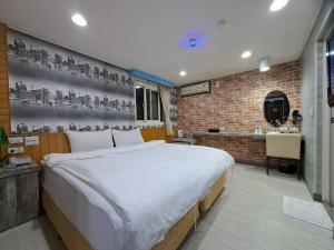 Bin Chen Business Hotelにあるベッド
