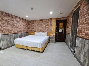 Bin Chen Business Hotelにあるベッド
