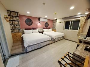 Bin Chen Business Hotelにあるベッド