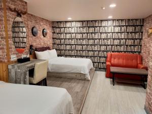 Postel nebo postele na pokoji v ubytování Bin Chen Business Hotel
