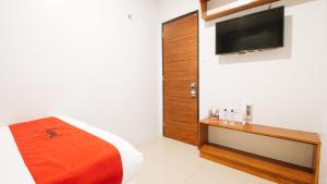 Llit o llits en una habitació de RedDoorz near Quiapo Church Manila