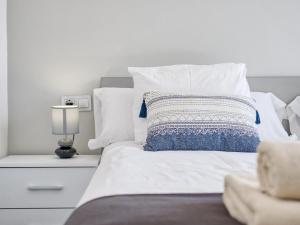Łóżko lub łóżka w pokoju w obiekcie Sur Suites El Carmen