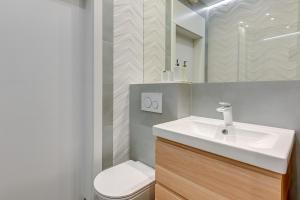 Koupelna v ubytování Comfort Apartments Granaria