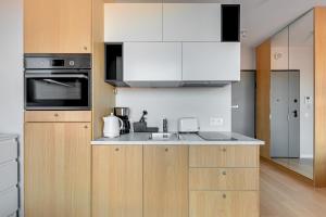 Kuchyň nebo kuchyňský kout v ubytování Comfort Apartments Granaria