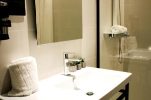Koupelna v ubytování Arena Zone Hotel