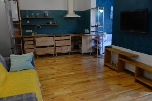 TV a/nebo společenská místnost v ubytování Romantic Guest House