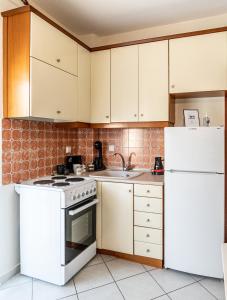 Η κουζίνα ή μικρή κουζίνα στο Yellow Fresh Apartment 2