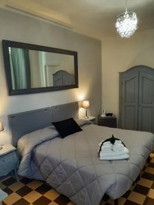 Ένα ή περισσότερα κρεβάτια σε δωμάτιο στο B&B Principe Calaf 3