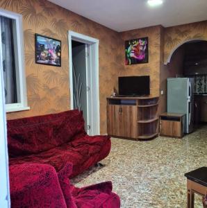TV a/nebo společenská místnost v ubytování Guest House Nua