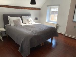 Postel nebo postele na pokoji v ubytování Huize Bronsgroen - vakantiehuis voor 2-6 pers in Limburgse Heuvelland