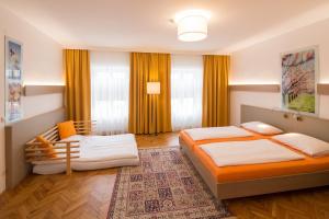 Кровать или кровати в номере Hotel Stadt Melk