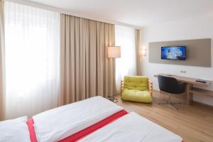 TV a/nebo společenská místnost v ubytování Hotel Stadt Melk