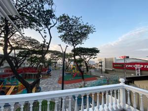 a view from a balcony of a playground at WHITE HOUSE in Guayaquil