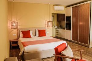 Postel nebo postele na pokoji v ubytování Hotel Neptuno