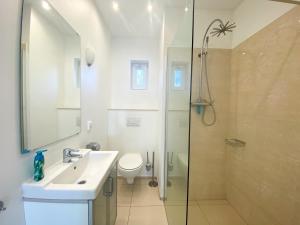 Koupelna v ubytování Luxe Vakantiehuis Oostkapelle OK32 + 17 fotografií