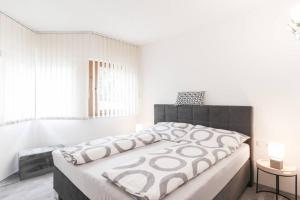 Letto o letti in una camera di Apart Hackl