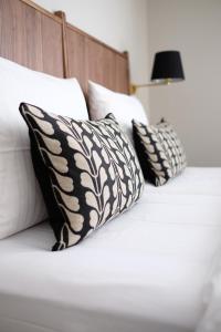 Postel nebo postele na pokoji v ubytování Parkhotel Obermenzing
