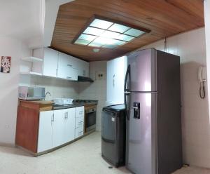 Kuchyň nebo kuchyňský kout v ubytování Oferta frente a la playa Cartagena . En, Sp, It. + 8 fotografií