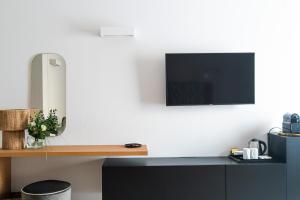 TV a/nebo společenská místnost v ubytování Casa Almika Sparano